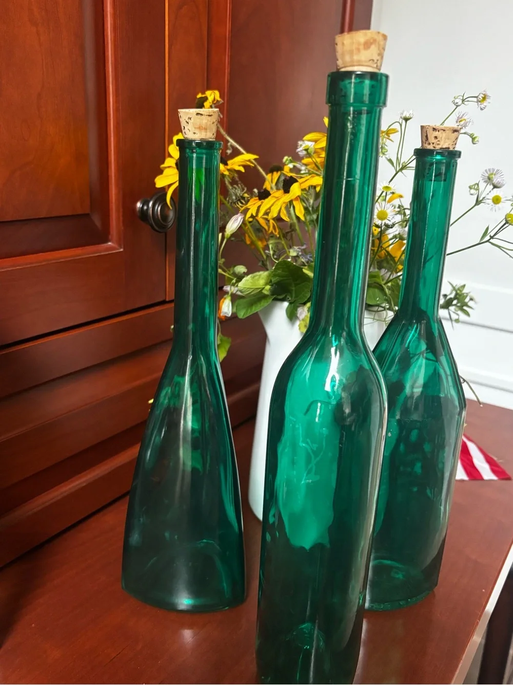 English Georgian green blown glass bottle-shape decanters set of 3